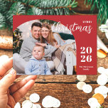 1 photo Christmas arch modern minimalist red Holiday Card<br><div class="desc">This elegant and modern Christmas greeting card features a minimalist design displaying 1 of your favourite family pictures inside a trendy arch frame. Easily customisable with your family name and the current year in stylish serif fonts over a festive red background.</div>