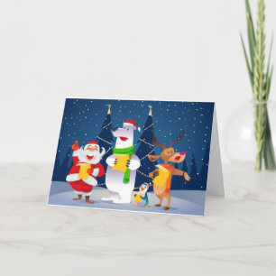 "1 YR OLD'S" CHRISTMAS CARD WITH SANTA/CAROLERS