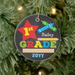 1st Grade First Grade Keepsake Chalkboard Colourfu Ceramic Tree Decoration<br><div class="desc">This first grade ornament features a star, a ruler, a pencil, crayons and bold, colourful fun typography! Click the customise button for more options for modifying the text! Variations of this design, additional colours, as well as coordinating products are available in our shop, zazzle.com/store/doodlelulu. Contact us if you need this...</div>
