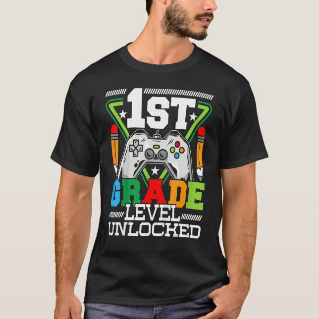 1st Grade Level Unlocked  First Day Of School Vide T-Shirt (Front)