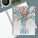 2023 Personalised Planner<br><div class="desc">This unique Planner is decorated with a brightly coloured mosaic tree on a pale grey background. Customise it with your name and year. To edit further use the Design Tool to change the font, font size, or colour. Because we create our artwork you won't find this exact image from other...</div>