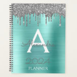 2023 Silver Teal Aqua Blue Glitter Monogram Planner<br><div class="desc">2023 Silver and Aqua Blue Teal Sparkle Glitter Monogram Name and Initial Spiral Notebook Wedding or Annual Planning Calendar. This makes the perfect sweet 16 birthday,  wedding,  bridal shower,  anniversary,  baby shower or bachelorette party gift for someone that loves glam luxury and chic styles.</div>