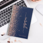 2024 Personalised Navy Blue Rose Gold Glitter Planner<br><div class="desc">Personalise this elegant modern design with your name in vertical rose pink signature handwriting script on a navy blue background trimmed with a rose gold faux glitter border. Add the year in sans serif font. (To keep the swashes at the beginning and end of the name, replace only the letters,...</div>