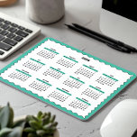 2025 Full Year Yearly Calendar Wavy Emerald Green Mouse Pad<br><div class="desc">Purple, black, and white—a minimal, basic 12-month 2025 Calendar Mousepad featuring a clean white background, a stylish Emerald Green wavy border, and sleek black accents. This design offers a modern look perfect for your home office, a thoughtful yet simple gift for a coworker, or a functional addition to a school...</div>