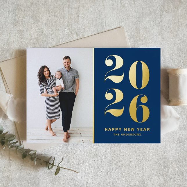 2025 Modern Bold Typography Blue New Year Photo Foil Holiday Card (Customizable photo Happy New Year card featuring 2026 in gold foil and navy blue background.)