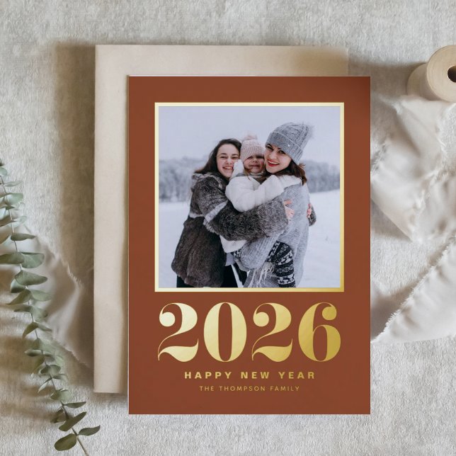 2025 Typography Terracotta Happy New Year Photo Foil Holiday Card (Welcome 2026 with this gold foil New Year photo card featuring a terracotta background.)