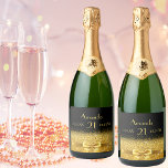 21st birthday party black and faux gold bow name sparkling wine label<br><div class="desc">Elegant,  classic,  glamourous and feminine for a 21st birthday party.  A gold coloured ribbon and bow with golden glitter and sparkle,  a bit of bling and luxury.  Black background. Templates for a name,  age 21,  date of birth and date of anniversary and age number. Golden letters.</div>