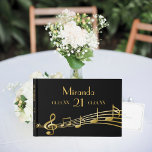 21st birthday party black gold music notes guest book<br><div class="desc">Elegant and modern guestbook for a 21st birthday party with faux gold music notes as decor. Templates for the age 21, name, date of birth and date of the anniversary. For both him and her. You can change the black background colour to match your theme. Click customise and then "select...</div>