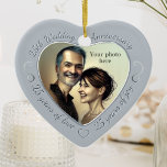 25th Wedding Anniversary Photo Ceramic Tree Decoration<br><div class="desc">Celebrate 25 years of marriage with a special custom photo ornament in a delightful heart shape frame. Simply upload your own photo of the married couple and it will appear in the cutout. The silver-grey surround features a script font and decorations. (Please note that no actual metallic or shiny ink...</div>
