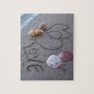 2 Hearts  in the sand with shells with Love Jigsaw Puzzle
