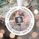 2 Photo 1st Xmas Expecting Baby New Parents Modern Ornament<br><div class="desc">Celebrate the precious gift of your newest family member with a stylish two photo round acrylic ornament. Gender neutral design is suitable for a new baby boy or girl. Wording and pictures on this template are simple to personalise, and can be different or the same on front and back. (IMAGE...</div>