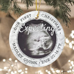 2 Photo Baby Ultrasound New Parents Faux Marble Ceramic Tree Decoration<br><div class="desc">Celebrate the precious gift of your newest family member with a stylish two photo round ceramic ornament. Gender neutral design is suitable for a new baby boy or girl. Wording and pictures on this template are simple to personalize, and can be different or the same on front and back. (IMAGE...</div>
