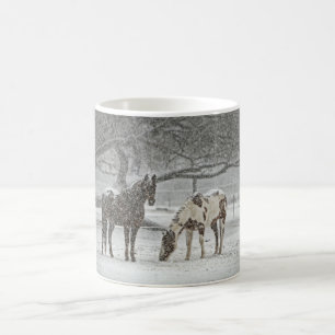 2 Snowy Horses Standing Under a Tree in Winter Coffee Mug