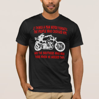 2 Things A Man Never Forgets… ©WhiteTigerLLC.com T-Shirt