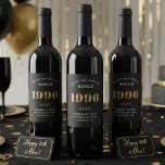 30th Birthday Name 1996 Black Gold Elegant Chic Wine Label<br><div class="desc">1996 Vintage 30th Birthday Black & Gold Elegant Wine Label. Celebrate your milestone with our exclusive 1996 Vintage 30th birthday wine label. The meticulously designed label with stunning black and gold hues effortlessly enhances the visual appeal of your favourite wine. The year 1996, prominently featured on the label, adds a...</div>