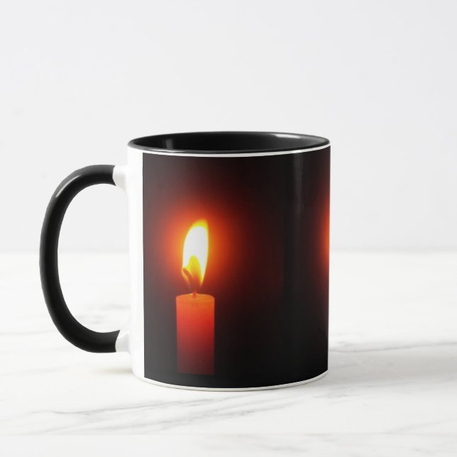 3 LIT RED CANDLES ON COFFEE MUG (Left)