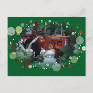 3 toy tractors at christmas holiday postcard