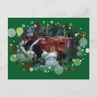 3 toy tractors at christmas holiday postcard