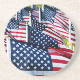 400 flags waving proudly in a field coaster