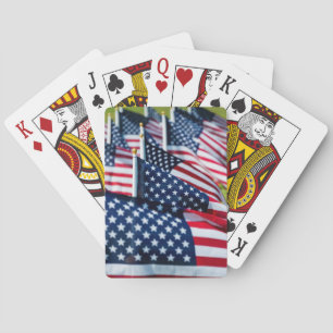 400 flags waving proudly in a field playing cards
