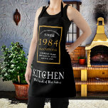40th Birthday 1984 Name Elegant Black Gold Chic Apron<br><div class="desc">Elegant Black & Gold Chic Apron - 40th Birthday 1984 Name Personalised Kitchen & BBQ Essentials. Celebrate a fabulous birthday with style and practicality! This Elegant Black & Gold Chic Apron, personalised for those born in 1984, is the perfect accessory for the culinary enthusiast in your life. Its eye-catching design,...</div>