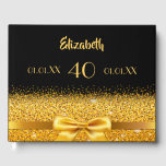 40th birthday black gold bow elegance guest book<br><div class="desc">Elegant,  classic,  glamourous and feminine.  A gold coloured ribbon with a bow with golden glitter and sparkle,  a bit of bling and luxury. A guestbook for a 40th birthday party. Black background. Templates for name,  age,  date of birth and anniversary date. Spine: add name and date.</div>