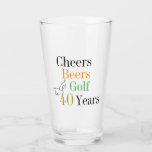 40th Birthday Cheers and Beers Golf Black and Gold Glass<br><div class="desc">This is a cool and modern, 40th birthday, golf party design. It is a simple, minimal design, in classic black and gold typography with pops of orange and green. Perfect for a cool and fun, golf and beer themed, 40th birthday party. This design is fully customisable, simply use the personalise...</div>