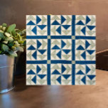 4.25" Blue White Pinwheel Patchwork Quilt Pattern Tile<br><div class="desc">This elegant blue and white ceramic tile features a vintage patchwork quilt pattern by American craftsman Ira Blount. Add rustic charm to your kitchen, bathroom, counter, backsplash or other tiled space. Also makes a great trivet. Traditional with geometric shapes that feel contemporary, this tile will add a unique touch to...</div>