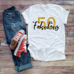 50 Fifty and Fabulous Gold Glitter Brush Script T-Shirt<br><div class="desc">This design was created though digital art. You may change the style of this shirt by choosing More > under the style option. It may be personalised by clicking the customise button and changing the colour, adding a name, initials or your favourite words. Contact me at colorflowcreations@gmail.com if you with...</div>