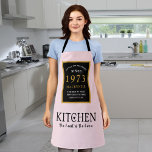 50th Birthday 1973 Name Elegant Black Gold Pink Apron<br><div class="desc">A wonderful birthday black and gold design on an apron for that special celebration. Easily customise the text using the template provided. Part of the setting standards range of birthday supplies.</div>