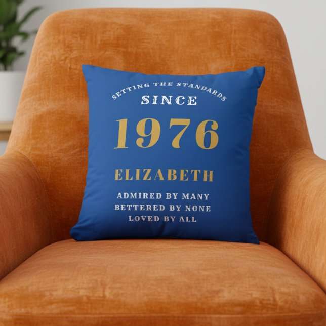 50th Birthday 1976 Add Name Blue Gold Personalized Cushion (1976 Blue throw pillow on orange chair.)