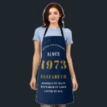 50th Birthday Born 1973 Blue Gold Lady's Apron<br><div class="desc">A personalised classic blue apron design for that birthday celebration. Add the name to this vintage retro style blue, white and gold design for a custom birthday gift. Easily edit the name and year with the template provided. A wonderful custom birthday gift. More gifts and party supplies for that party...</div>