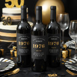 50th Birthday Name 1976 Black Gold Elegant Chic Wine Label<br><div class="desc">1976 Vintage 50th Birthday Black & Gold Elegant Wine Label. Celebrate your milestone with our exclusive 1976 Vintage 50th birthday wine label. The meticulously designed label with stunning black and gold hues effortlessly enhances the visual appeal of your favourite wine. The year 1976, prominently featured on the label, adds a...</div>