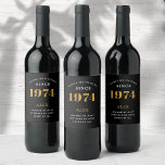 50th Birthday Name Year  Black Gold Elegant Chic Wine Label<br><div class="desc">Vintage 50th Birthday Black & Gold Elegant Wine Label. Celebrate your milestone with our exclusive Vintage 50th birthday wine label. The meticulously designed label with stunning black and gold hues effortlessly enhances the visual appeal of your favourite wine. The year, prominently featured on the label, adds a nostalgic throwback to...</div>