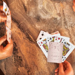 50th birthday rose gold stars name playing cards<br><div class="desc">Girly and trendy playing cards for a 50th birthday party. A feminine pink, rose gold faux metallic looking background decorated with shining and glittery rose gold coloured stars. Personalise and add a date and name/age 50. Curved text and dark rose gold coloured letters. The name is written with a modern...</div>