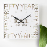 50th Gold Wedding Anniversary Gift<br><div class="desc">Stylish and elegant keepsake wall clock designed for a milestone fifty year wedding anniversary.  Easily personalise and customise by initials and year(s) for special friends,  couples,  parents or your husband / wife. Be sure to check out the rest of my collection for more gifting ideas.</div>