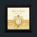 50th Wedding Anniversary Gold Monogram Gift Box<br><div class="desc">Beautiful Victorian style vintage gold filigree emblem with jewel accents on ivory and gold damask background. Just customise the raised-letter look monogram and personalise the names and wedding for that special couple on your gift list. Can be easily customised for other gift-giving celebrations -- holiday, birthday, wedding, anniversary, engagement, Valentine's...</div>