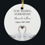 50th wedding anniversary white swans in love ceramic tree decoration<br><div class="desc">Two beautiful swans in love bending their heads toghether and forming a heart. White elegant background,  perfector for a wedding anniversary!  A swan couple stay together for life,  so they are the perfect symbol of love. With the text: 50th Anniversary. Template for two names,  black letters.</div>