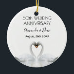 50th wedding anniversary white swans in love ceramic tree decoration<br><div class="desc">Two beautiful swans in love bending their heads toghether and forming a heart. White elegant background,  perfector for a wedding anniversary!  A swan couple stay together for life,  so they are the perfect symbol of love. With the text: 50th Anniversary. Template for two names,  black letters.</div>