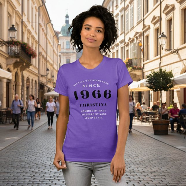 60th Birthday 1966 Purple Ladies Personalised T-Shirt (1966 purple t-shirt worn by a woman in a street.)