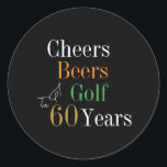 60th Birthday Cheers and Beers Golf Black and Gold Classic Round Sticker<br><div class="desc">This is a cool and modern, 60th birthday, golf party design. It is a simple, minimal design, in classic black and gold typography with pops of orange and green. Perfect for a cool and fun, golf and beer themed, 60th birthday party. This design is fully customisable, simply use the personalise...</div>