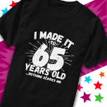 65 Year Old Sarcastic Meme Funny 65th Birthday T-Shirt<br><div class="desc">This funny 65th birthday design makes a great sarcastic humour joke or novelty gag gift for a 65 year old birthday theme or surprise 65th birthday party! Features 'I Made it to 65 Years Old... Nothing Scares Me' funny 65th birthday meme that will get lots of laughs from family, friends,...</div>