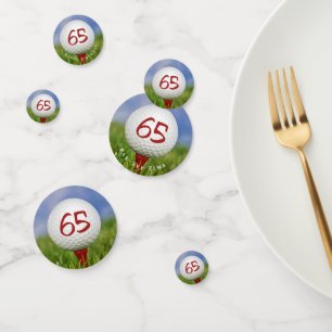 65th birthday golf ball on red tee confetti