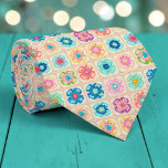 70s Granny Square Crochet Necktie<br><div class="desc">This unique necktie features a vibrant 70s-inspired design, crafted with intricate granny square crochet. It's a bold and stylish statement piece, perfect for adding a touch of retro charm and handmade artistry to any outfit. The warm, inviting colors and textured pattern make it a conversation starter, suitable for both casual...</div>