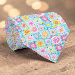 70s Granny Square Crochet Necktie<br><div class="desc">This unique necktie features a vibrant 70s-inspired design, crafted with intricate granny square crochet. It's a bold and stylish statement piece, perfect for adding a touch of retro charm and handmade artistry to any outfit. The warm, inviting colors and textured pattern make it a conversation starter, suitable for both casual...</div>