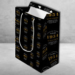 70th Birthday 1954 Black Gold Chic Elegant Medium Gift Bag<br><div class="desc">70th Birthday Chic 1954 Themed Black & Gold Elegant Gift Bags. Celebrate the journey of the vintage years with our 70th Birthday 1954 Black and Gold Chic Elegant Gift Bags. Wrapped in class and elegance, these high-quality gift bags offer a fully personalised touch, reflecting the chic vibes of the birthday....</div>