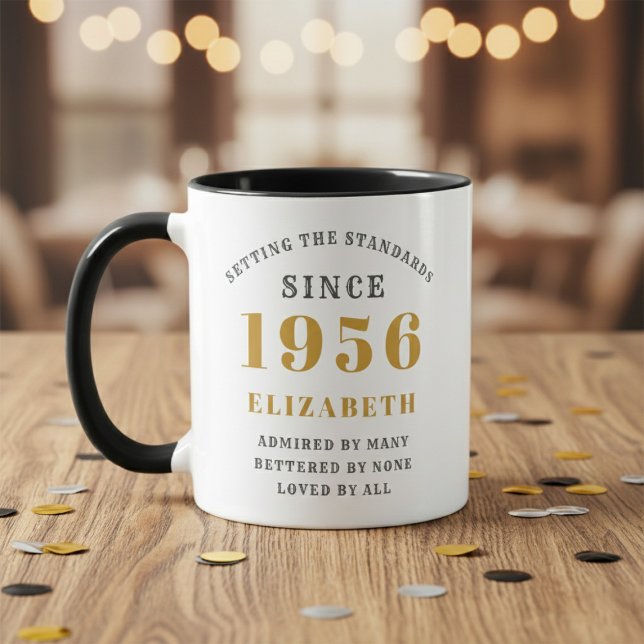 70th Birthday 1956 Add Name Elegant Mug (Born 1956 birthday gift mug. Wood table, blurred background.)