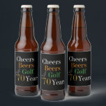 70th Birthday Cheers Beers Golf Black Gold Party Beer Bottle Label<br><div class="desc">This is a cool and modern, 70th birthday, golf party design. It is a simple, minimal design, in classic black and gold typography with pops of orange and green. Perfect for a cool and fun, golf and beer themed, 70th birthday party and ideal as a gift or for party favours....</div>