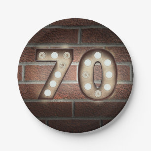 70th birthday marquee sign on brick wall paper plate