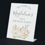 70th Birthday Party Pumpkin Fall Leaves Welcome Pedestal Sign<br><div class="desc">An elegant white watercolor pumpkin is nestled in fall leaves and flowers. The sophisticated blend of deep earth tones and soft pastels creates a unique aesthetic your guests will love. All the text is easily edited,  so you can set just the right tone.</div>